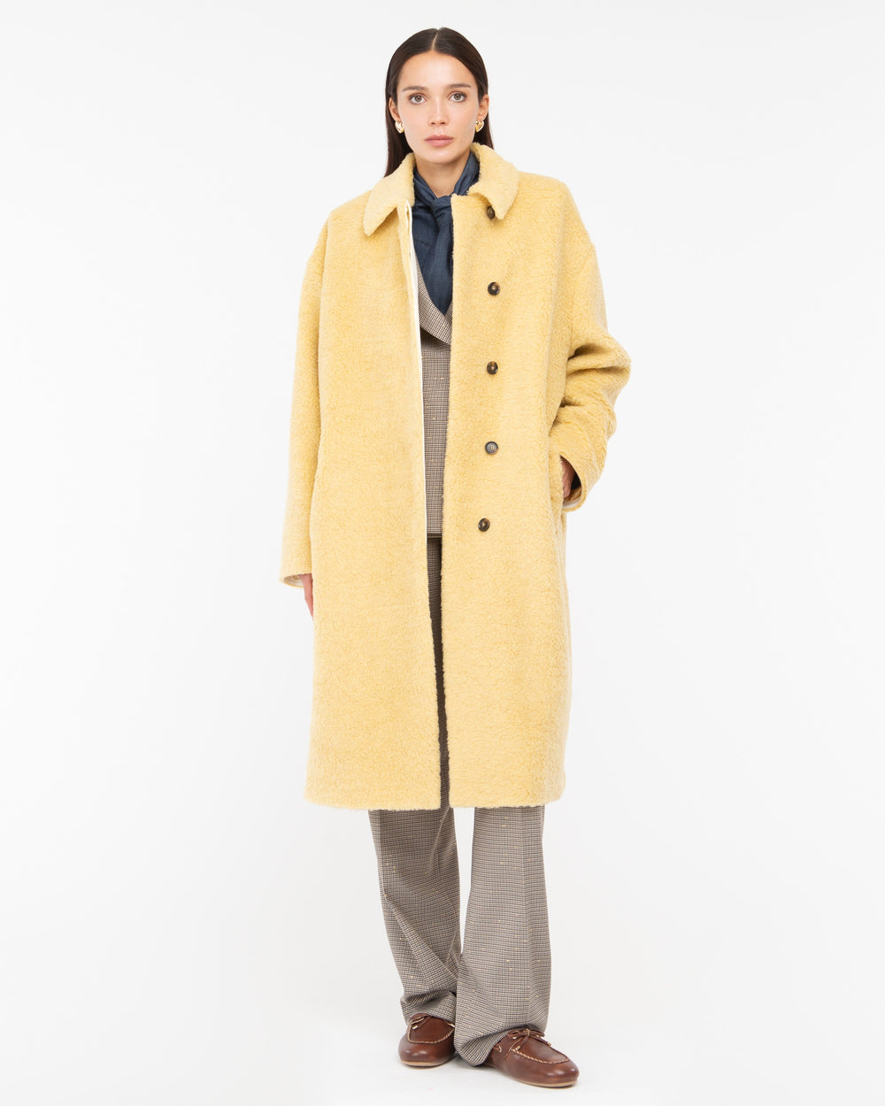 yellow teddy over coat