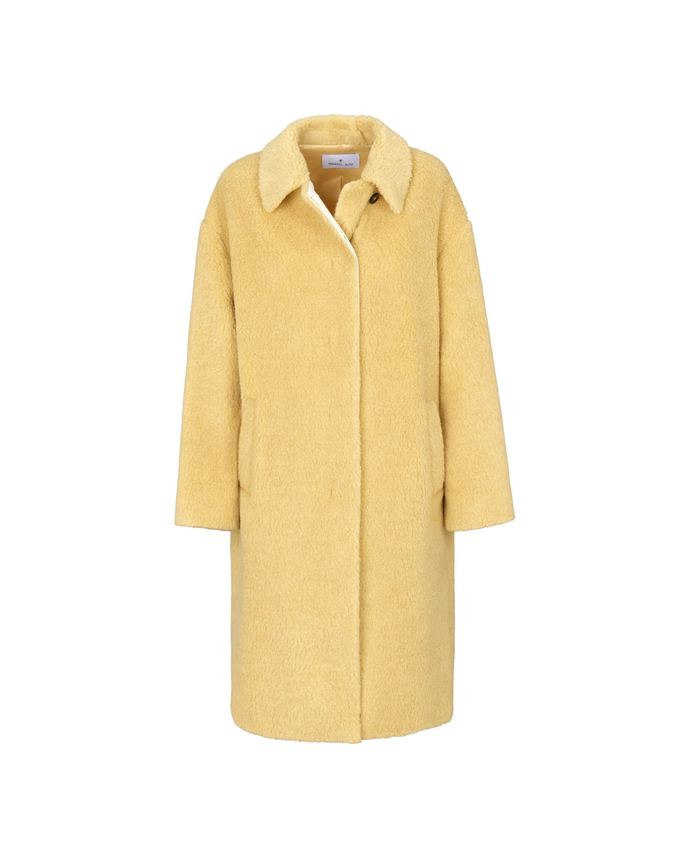 yellow teddy over coat