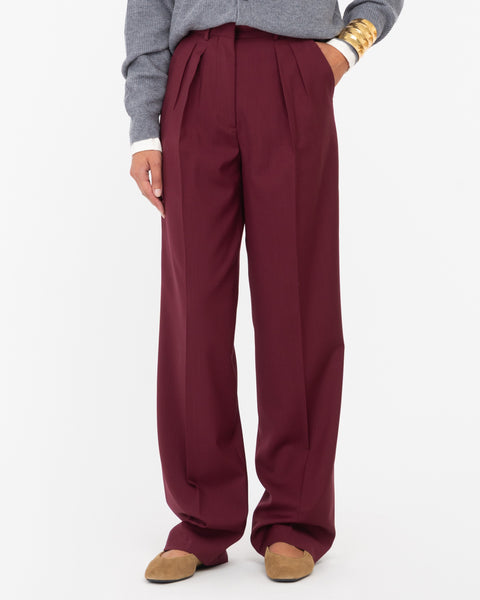 red wool double pleat trousers