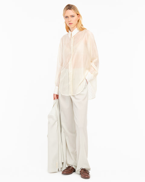 white oversized shirt with appliqués