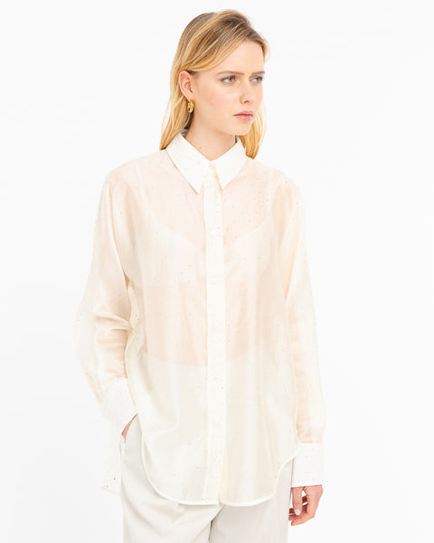 white oversized shirt with appliqués