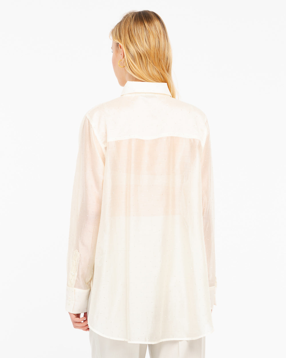 white oversized shirt with appliqués
