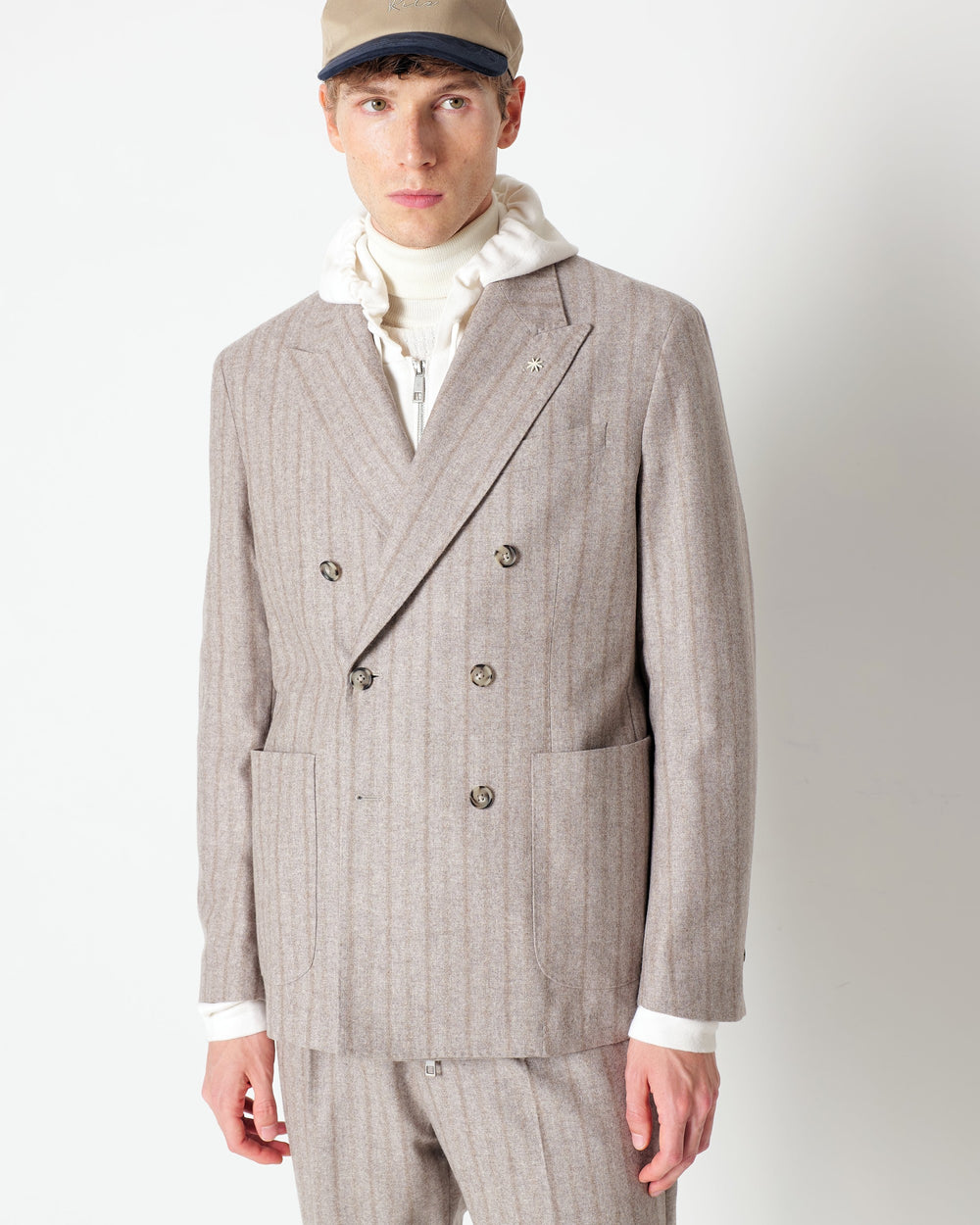 beige double breasted pinstripe suit in a wool blend