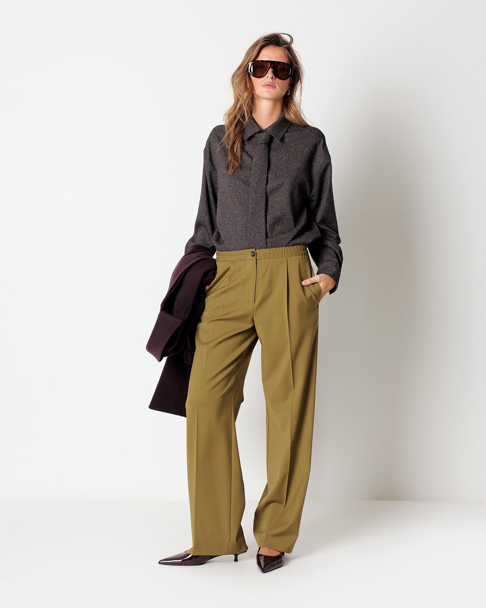 green stretch wool pleated trousers