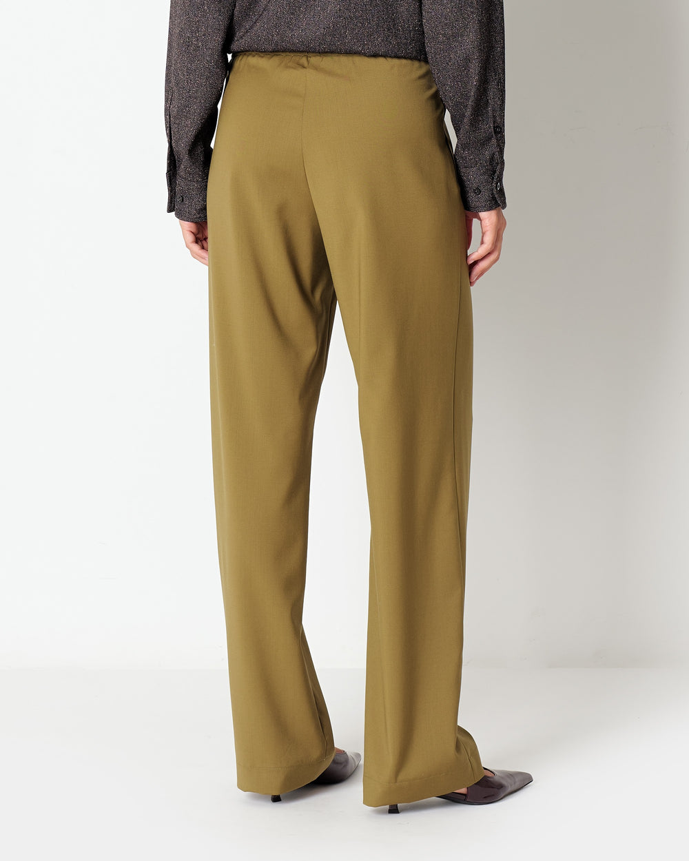 green stretch wool pleated trousers