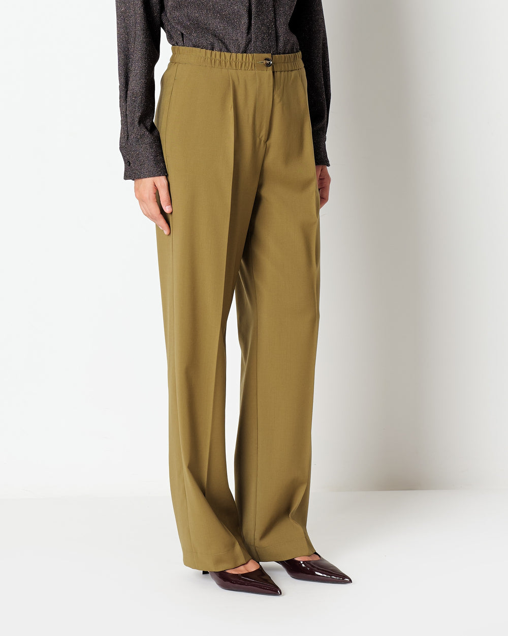 green stretch wool pleated trousers